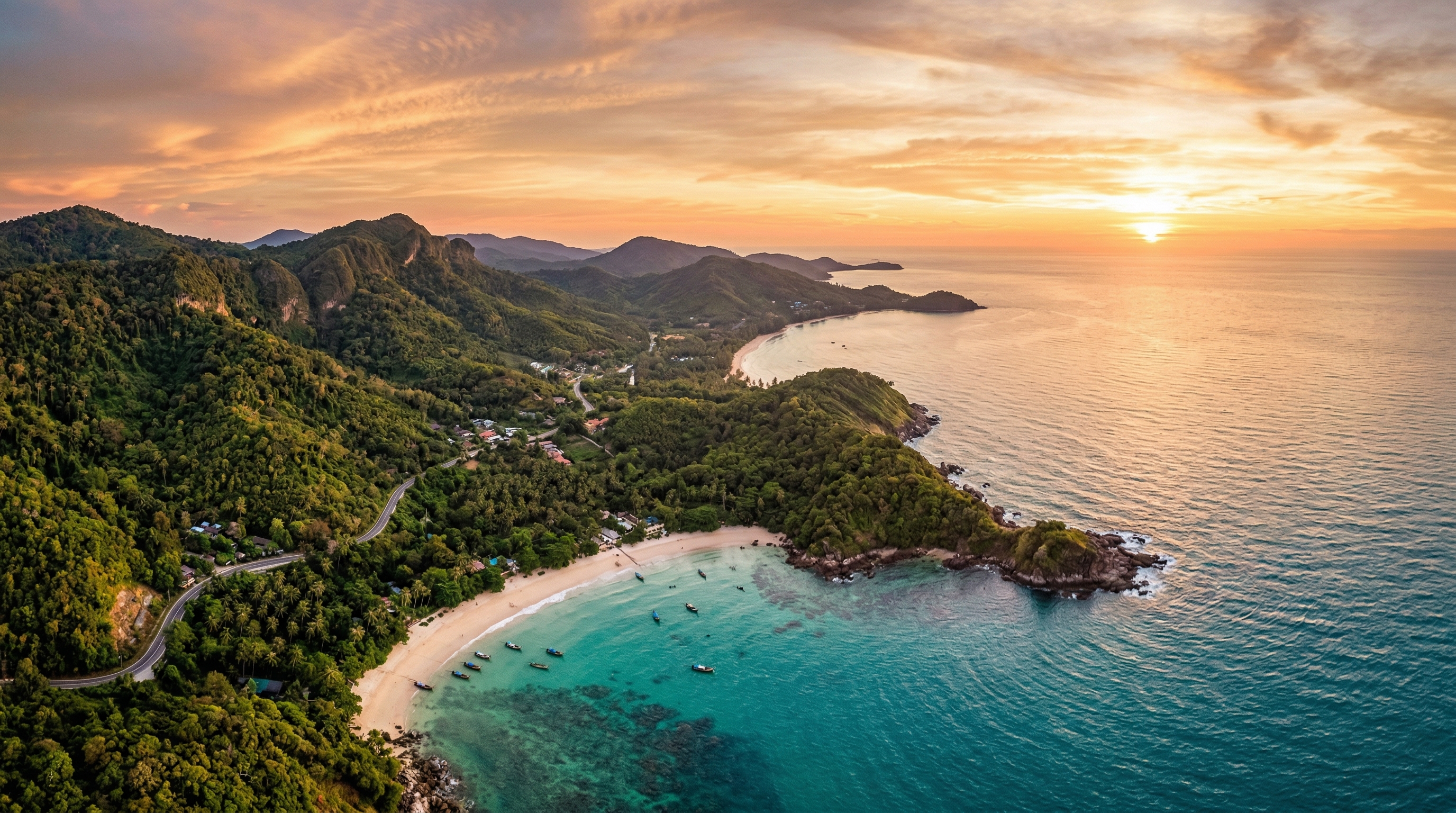 Aerial view of a lush tropical coastline at golden hour, turquoise water meeting green hills